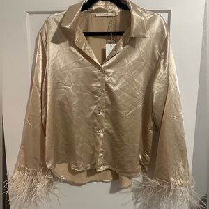 gold satin button up womens shirt with feathered wrists
